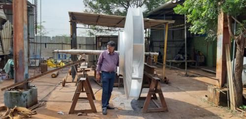 Mobile axial flow fan with adjustable tilt for temporary airflow.